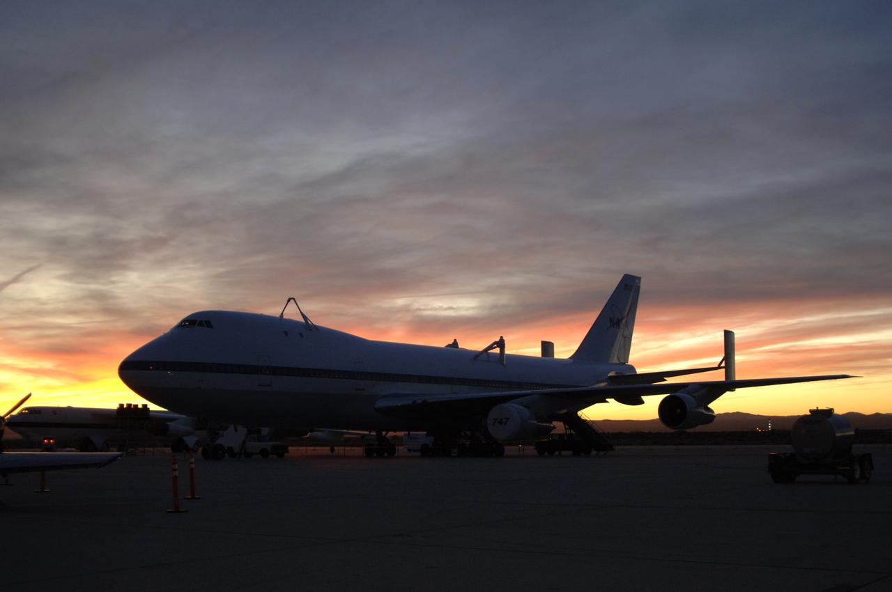 NASA Shuttle Carrier Aircraft on the ramp at sunset